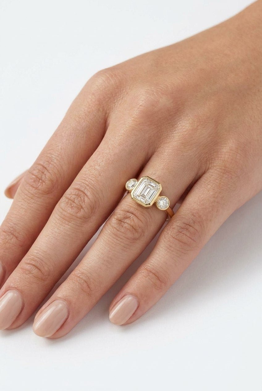 Golden Orbit Three-Stone Ring by Natkina