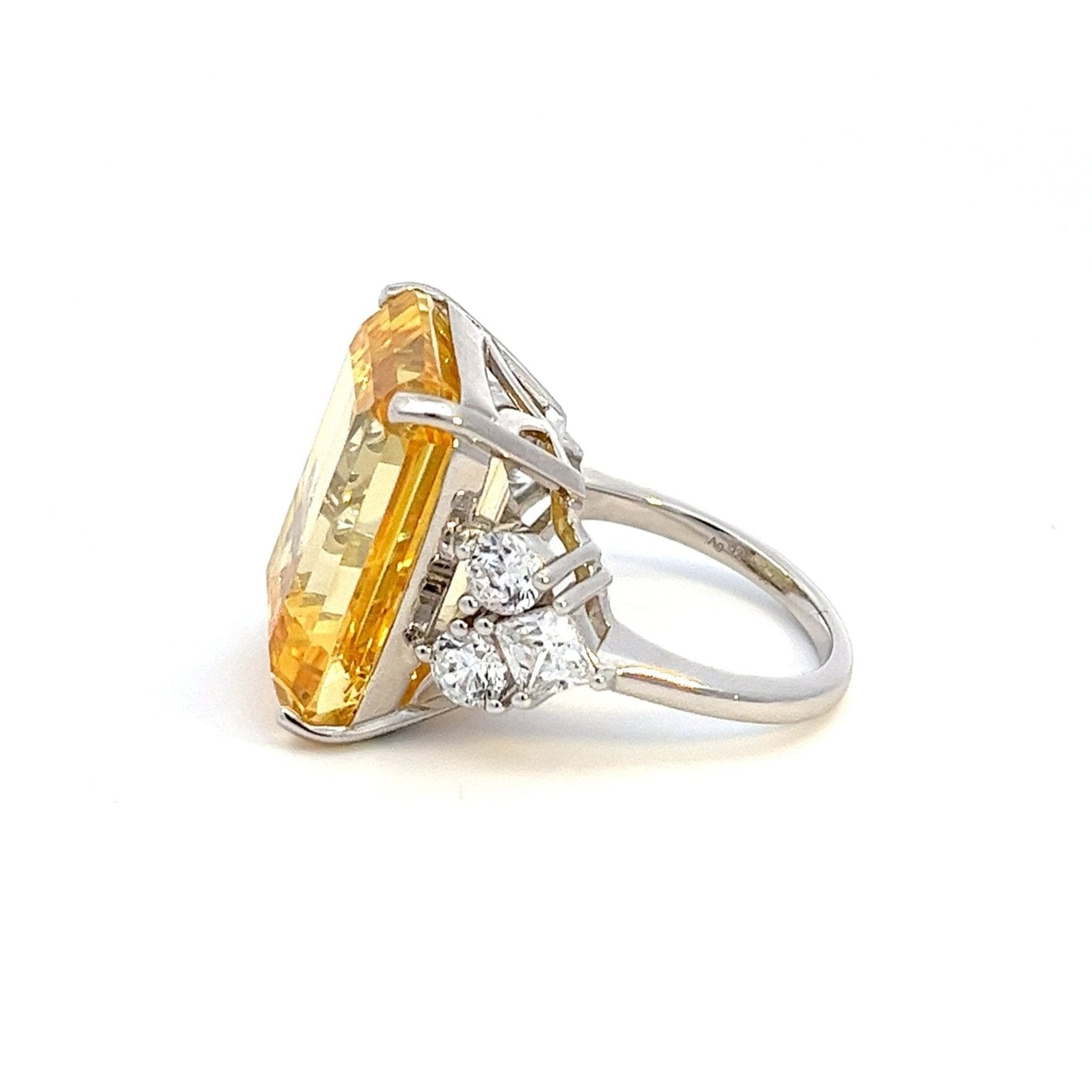 Gorgeous Emerald Cut Three Stone Silver Ring by Natkina