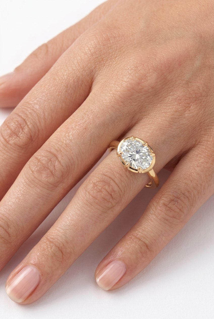 Oval Solitaire Ring by Natkina