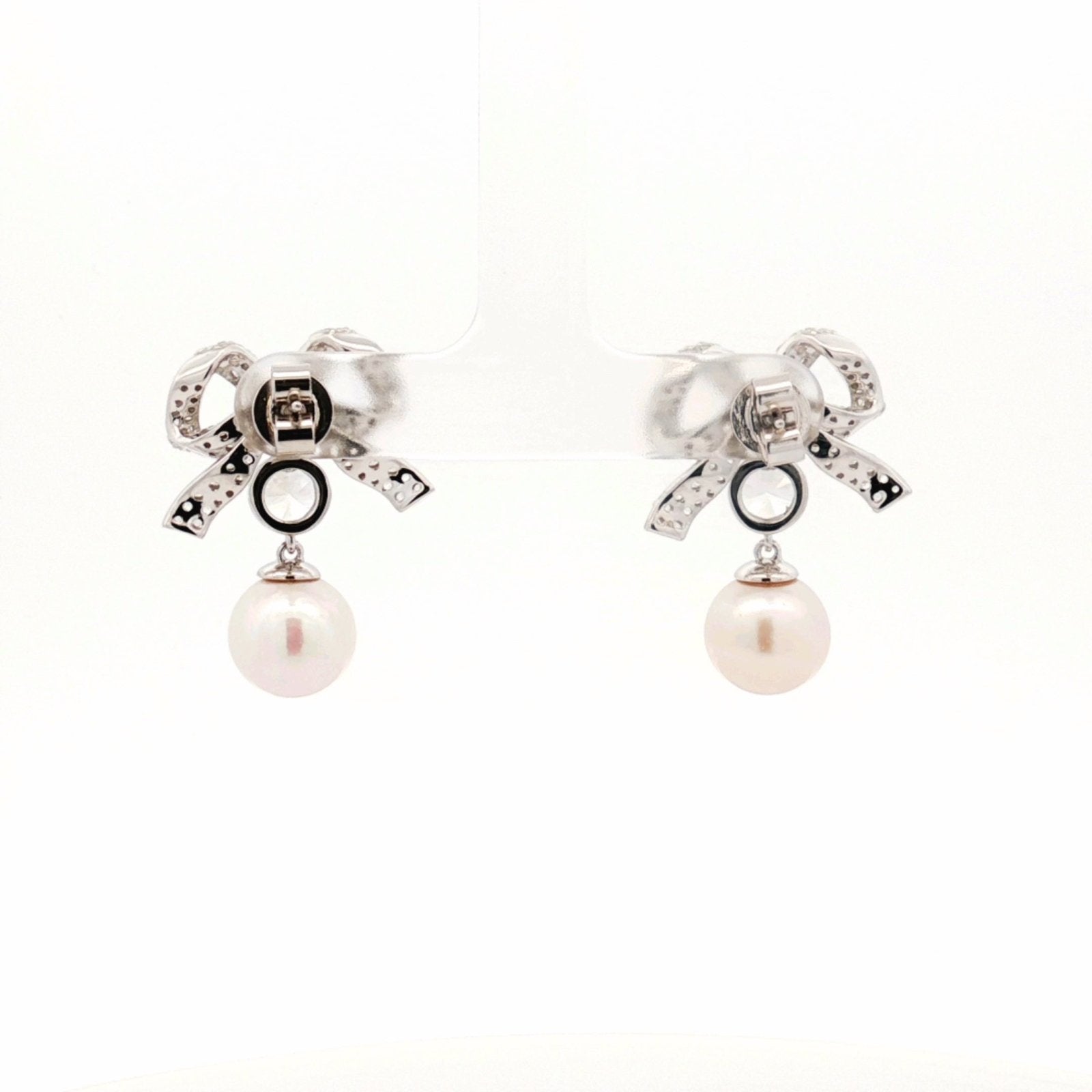 Pearl Bow Earrings by Natkina
