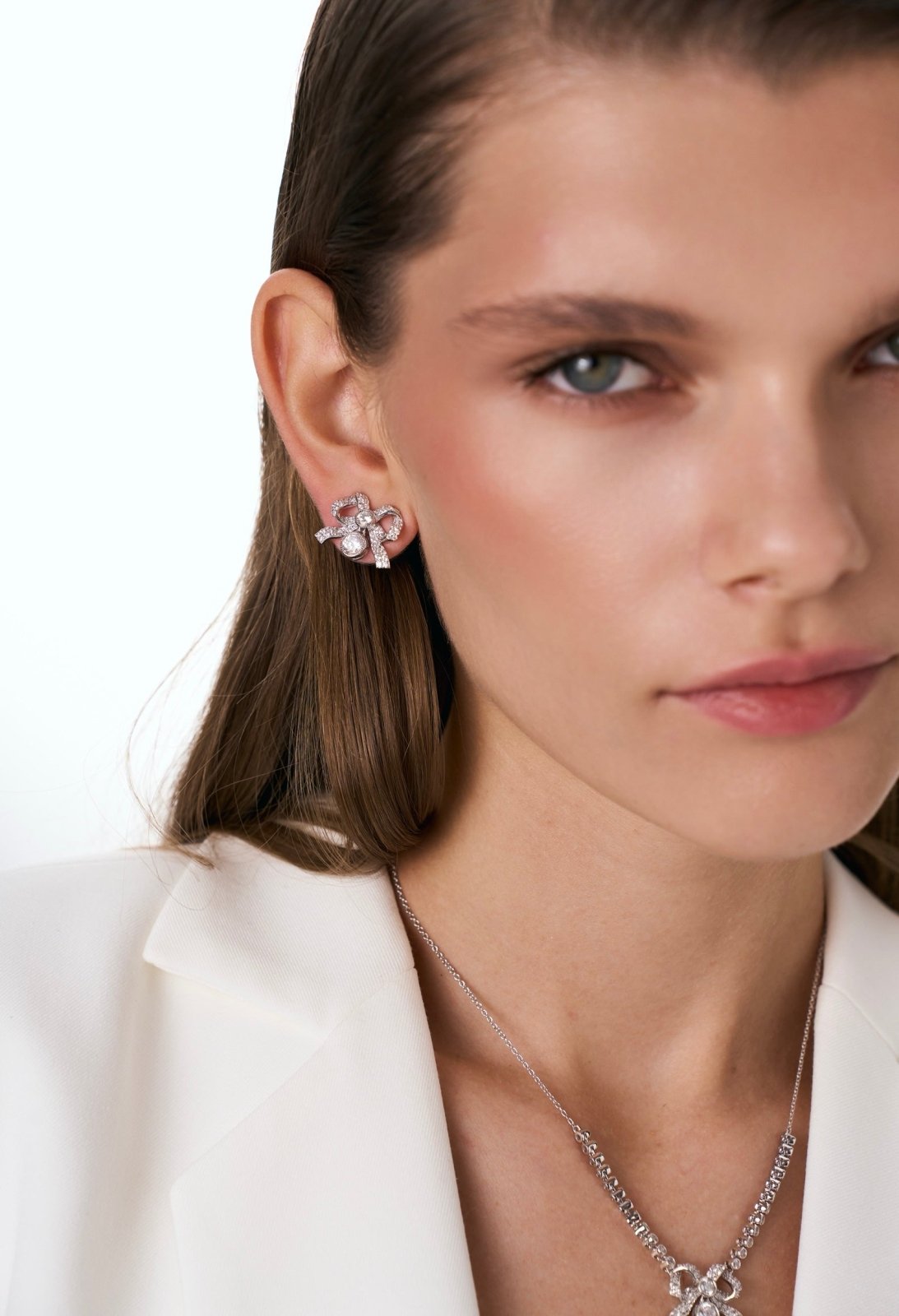 Silver Sparkle Bow Earrings by Natkina