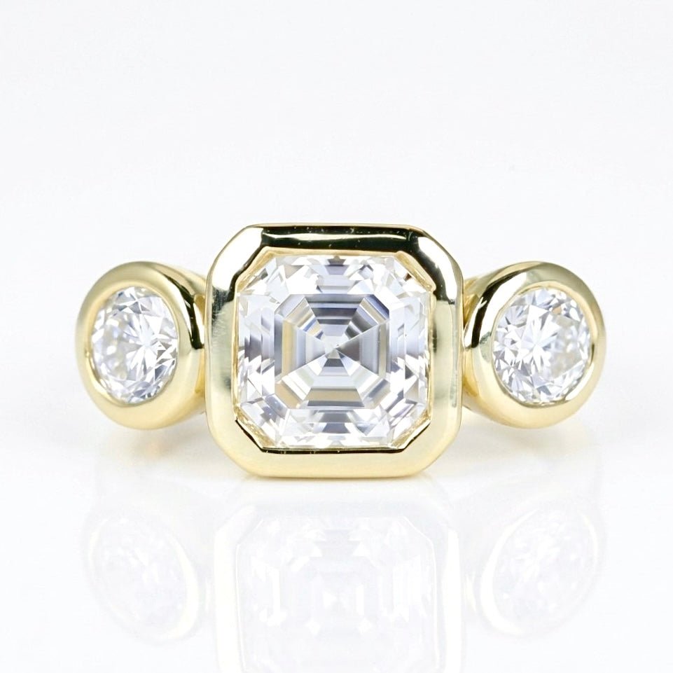Golden Orbit Three-Stone Ring by Natkina