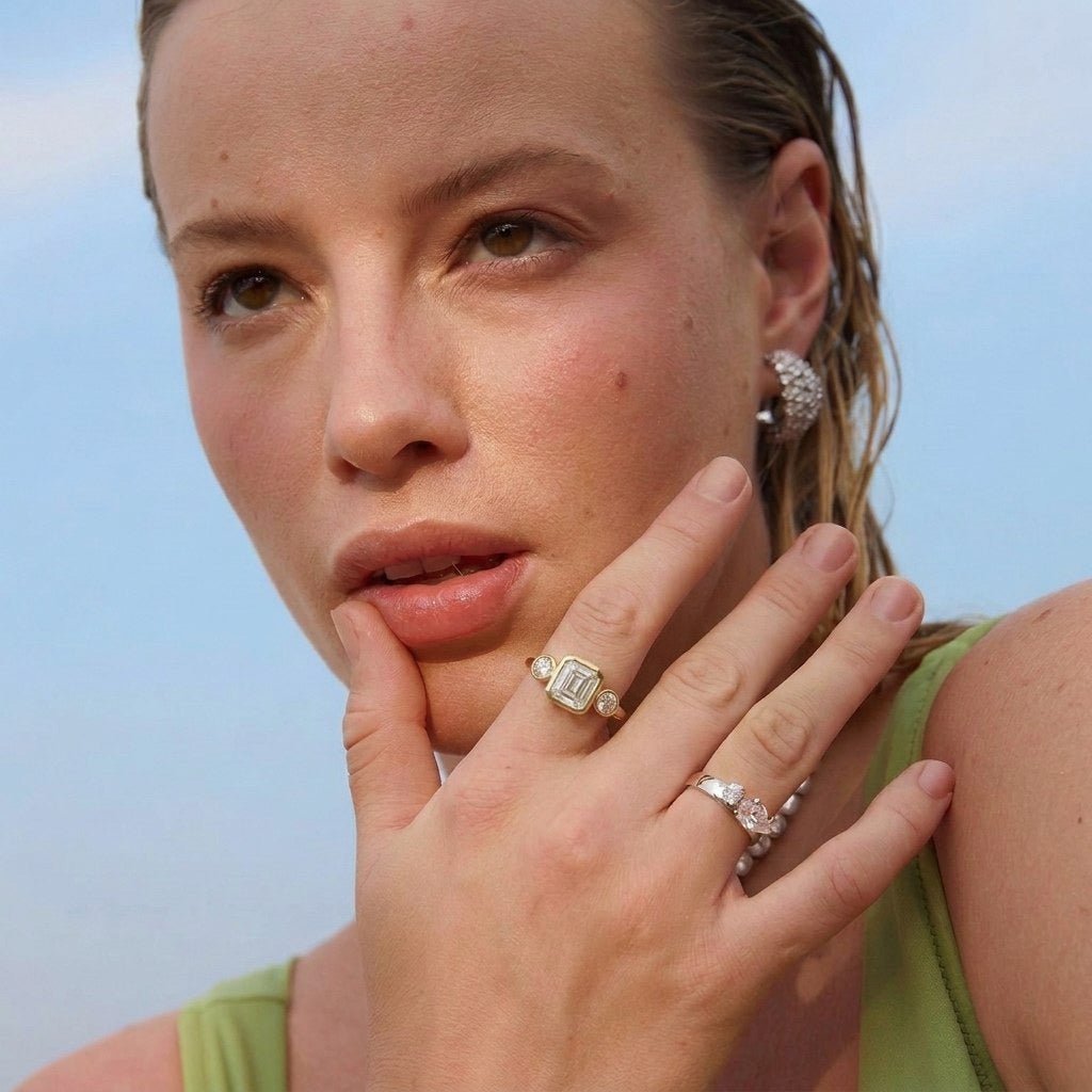 Golden Orbit Three-Stone Ring by Natkina
