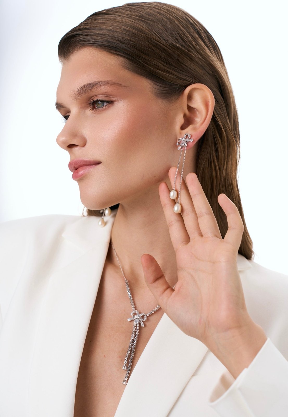 Silver Pearl Bow Earrings by Natkina
