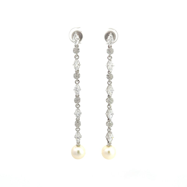 Extravagant Dangling Pearl Silver Earrings